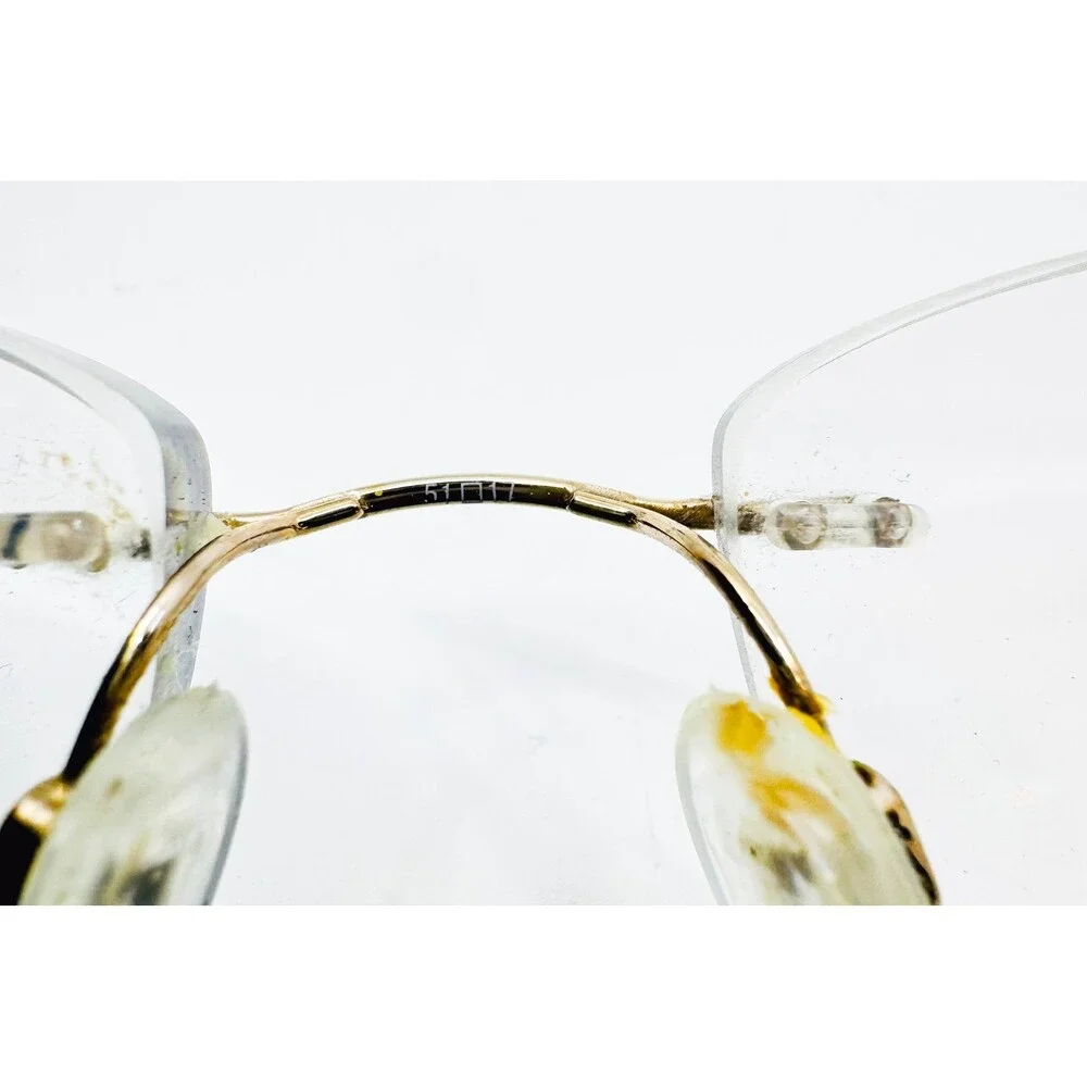 Charmant Line Art Eyeglasses Womens Gold Rimless XL2063 Titan 51-17-135 43019